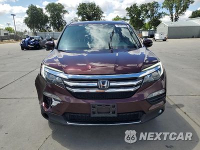 Piąte zdjęcie samochodu w środku: 2017 HONDA PILOT TOURING VIN:5FNYF6H93HB034700 - miniatura
