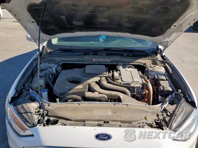 Zdjęcie 11 z 12 samochodu: 2018 FORD FUSION SE HYBRID VIN:3FA6P0LU5JR129797 - miniatura