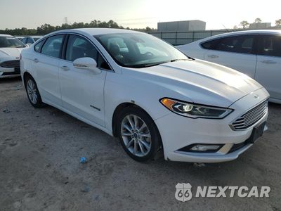 Czwarte zdjęcie samochodu z boku: 2017 FORD FUSION SE HYBRID VIN:3FA6P0LU3HR409549 - miniatura
