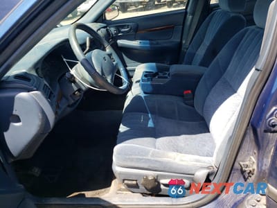 Zdjęcie 7 z 14 samochodu: 2003 CHEVROLET IMPALA VIN:2G1WF52K339235872 - miniatura
