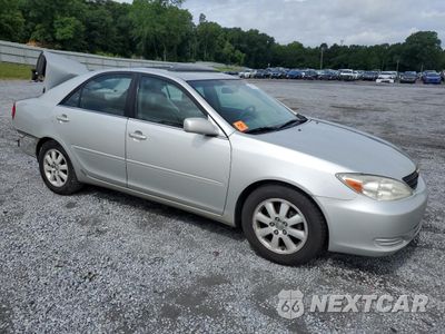 Czwarte zdjęcie samochodu z boku: 2002 TOYOTA CAMRY LE VIN:4T1BE32K22U634900 - miniatura