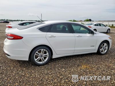 Trzecie zdjęcie samochodu z tyłu: 2018 FORD FUSION SE HYBRID VIN:3FA6P0LU0JR129951 - miniatura