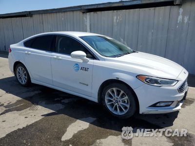 Czwarte zdjęcie samochodu z boku: 2017 FORD FUSION SE HYBRID VIN:3FA6P0LU7HR409201 - miniatura