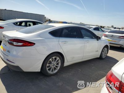 Trzecie zdjęcie samochodu z tyłu: 2019 FORD FUSION SE VIN:3FA6P0LU0KR124895 - miniatura