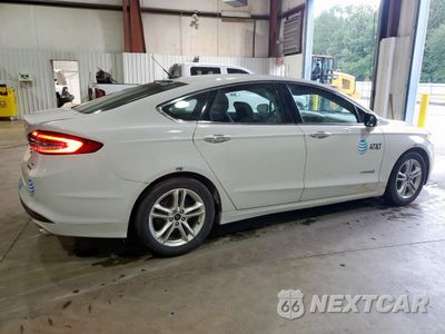 Trzecie zdjęcie samochodu z tyłu: 2018 FORD FUSION SE HYBRID VIN:3FA6P0LU8JR171705 - miniatura