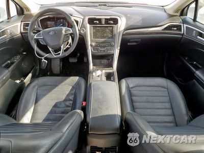 Zdjęcie 8 z 12 samochodu: 2017 FORD FUSION SE HYBRID VIN:3FA6P0LUXHR408981 - miniatura