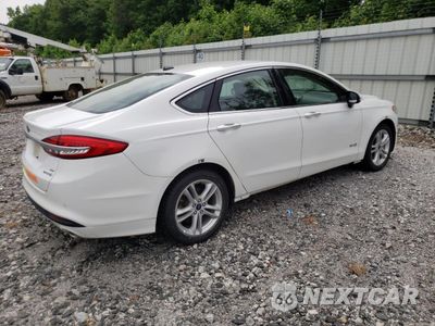 Trzecie zdjęcie samochodu z tyłu: 2018 FORD FUSION SE HYBRID VIN:3FA6P0LU4JR118855 - miniatura