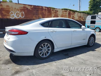Trzecie zdjęcie samochodu z tyłu: 2017 FORD FUSION SE HYBRID VIN:3FA6P0LU7HR409327 - miniatura