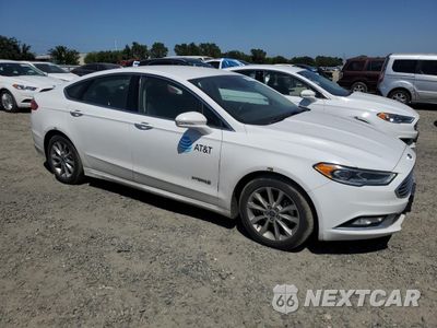 Czwarte zdjęcie samochodu z boku: 2017 FORD FUSION SE HYBRID VIN:3FA6P0LU4HR408927 - miniatura