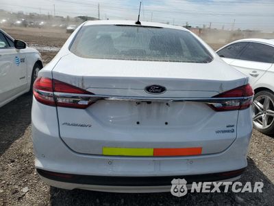 Zdjęcie 6 z 13 samochodu: 2018 FORD FUSION SE HYBRID VIN:3FA6P0LUXJR118732 - miniatura