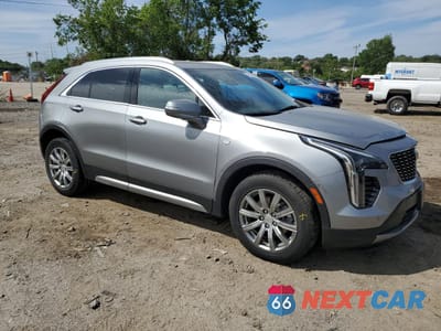 Czwarte zdjęcie samochodu z boku: 2023 CADILLAC XT4 PREMIUM LUXURY VIN:1GYFZCR47PF162751 - miniatura