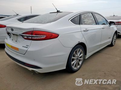 Trzecie zdjęcie samochodu z tyłu: 2017 FORD FUSION SE HYBRID VIN:3FA6P0LU3HR409017 - miniatura