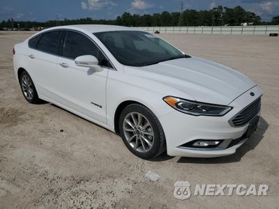 Czwarte zdjęcie samochodu z boku: 2017 FORD FUSION SE HYBRID VIN:3FA6P0LU5HR400724 - miniatura
