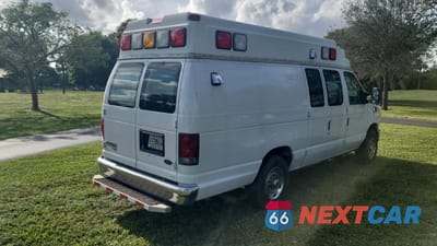 Czwarte zdjęcie samochodu z boku: 2013 FORD ECONOLINE E350 SUPER DUTY VAN VIN:1FDSS3EL0DDA69174 - miniatura