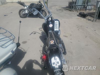 Czwarte zdjęcie samochodu z boku: 1997 HARLEY-DAVIDSON FXST CUSTOM VIN:1HD1BKL11VY029528 - miniatura