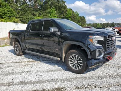 Czwarte zdjęcie samochodu z boku: 2019 GMC SIERRA K1500 AT4 VIN:1GTP9EED4KZ169434 - miniatura