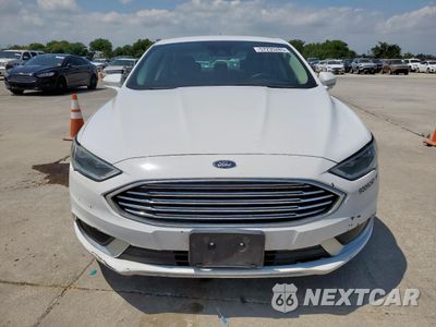 Piąte zdjęcie samochodu w środku: 2018 FORD FUSION SE HYBRID VIN:3FA6P0LUXJR171883 - miniatura