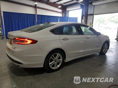Trzecie zdjęcie samochodu z tyłu: 2018 FORD FUSION SE HYBRID VIN:3FA6P0LU2JR118840 - miniatura