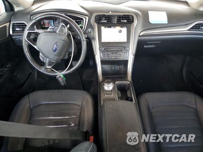 Zdjęcie 8 z 12 samochodu: 2017 FORD FUSION SE HYBRID VIN:3FA6P0LU6HR409643 - miniatura
