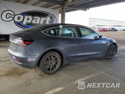 Trzecie zdjęcie samochodu z tyłu: 2018 TESLA MODEL 3 VIN:5YJ3E1EB7JF093276 - miniatura