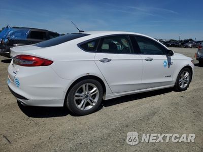 Trzecie zdjęcie samochodu z tyłu: 2018 FORD FUSION SE HYBRID VIN:3FA6P0LU2JR171540 - miniatura