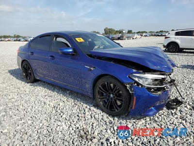 Czwarte zdjęcie samochodu z boku: 2019 BMW M5 VIN:WBSJF0C50KB285065 - miniatura