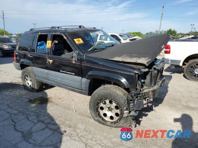 Czwarte zdjęcie samochodu z boku: 1997 JEEP GRAND CHEROKEE LAREDO VIN:1J4GZ58S1VC707714 - miniatura