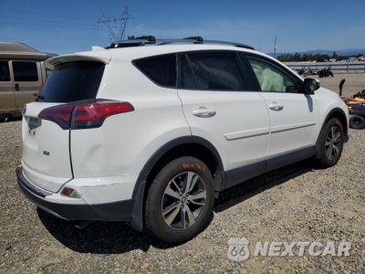 Trzecie zdjęcie samochodu z tyłu: 2017 TOYOTA RAV4 XLE VIN:JTMWFREV4HJ715662 - miniatura