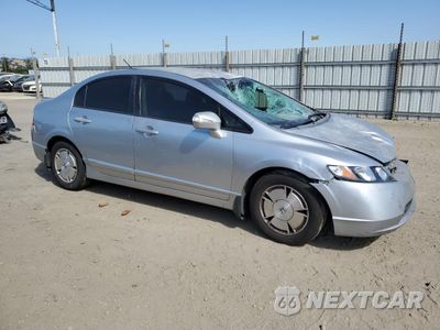 Czwarte zdjęcie samochodu z boku: 2007 HONDA CIVIC HYBRID VIN:JHMFA36267S026911 - miniatura