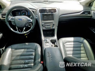 Zdjęcie 8 z 12 samochodu: 2017 FORD FUSION SE HYBRID VIN:3FA6P0LUXHR409001 - miniatura