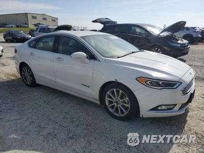 Czwarte zdjęcie samochodu z boku: 2017 FORD FUSION SE HYBRID VIN:3FA6P0LU5HR410055 - miniatura