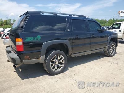 Trzecie zdjęcie samochodu z tyłu: 2003 CHEVROLET SUBURBAN K1500 VIN:3GNFK16Z43G187766 - miniatura