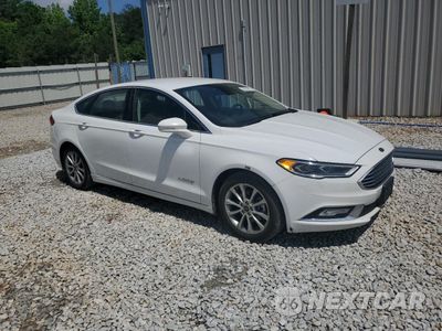 Czwarte zdjęcie samochodu z boku: 2017 FORD FUSION SE HYBRID VIN:3FA6P0LUXHR410083 - miniatura