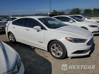Czwarte zdjęcie samochodu z boku: 2018 FORD FUSION SE HYBRID VIN:3FA6P0LU5JR281868 - miniatura