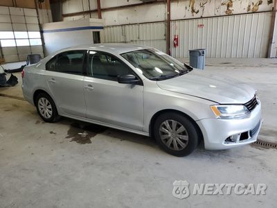Czwarte zdjęcie samochodu z boku: 2014 VOLKSWAGEN JETTA BASE VIN:3VW2K7AJ8EM243348 - miniatura