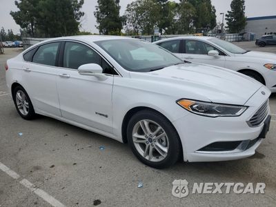 Czwarte zdjęcie samochodu z boku: 2018 FORD FUSION SE HYBRID VIN:3FA6P0LUXJR172144 - miniatura