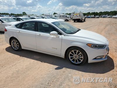 Czwarte zdjęcie samochodu z boku: 2017 FORD FUSION SE HYBRID VIN:3FA6P0LU4HR409625 - miniatura
