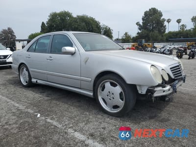 Czwarte zdjęcie samochodu z boku: 2000 MERCEDES-BENZ E 55 AMG VIN:WDBJF74J7YB055624 - miniatura