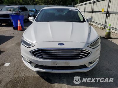 Piąte zdjęcie samochodu w środku: 2017 FORD FUSION SE HYBRID VIN:3FA6P0LUXHR409659 - miniatura