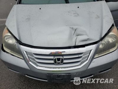 Zdjęcie 12 z 13 samochodu: 2010 HONDA ODYSSEY EXL VIN:5FNRL3H6XAB108136 - miniatura