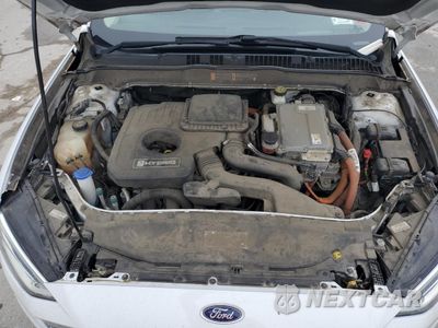 Zdjęcie 11 z 12 samochodu: 2017 FORD FUSION SE HYBRID VIN:3FA6P0LUXHR359605 - miniatura