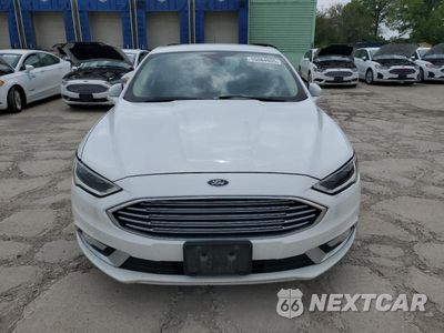 Piąte zdjęcie samochodu w środku: 2017 FORD FUSION SE HYBRID VIN:3FA6P0LUXHR410097 - miniatura