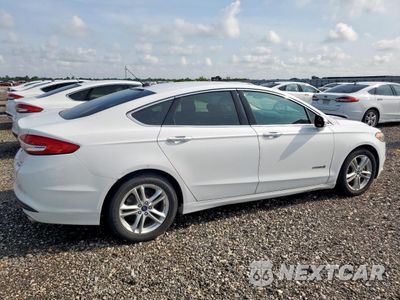 Trzecie zdjęcie samochodu z tyłu: 2018 FORD FUSION SE HYBRID VIN:3FA6P0LU1JR171691 - miniatura