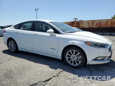 Czwarte zdjęcie samochodu z boku: 2017 FORD FUSION SE HYBRID VIN:3FA6P0LU6HR409321 - miniatura