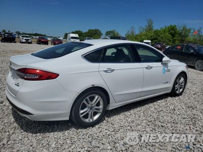 Trzecie zdjęcie samochodu z tyłu: 2018 FORD FUSION SE HYBRID VIN:3FA6P0LU2JR171862 - miniatura