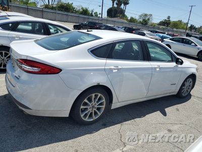 Trzecie zdjęcie samochodu z tyłu: 2017 FORD FUSION SE HYBRID VIN:3FA6P0LU0HR409685 - miniatura
