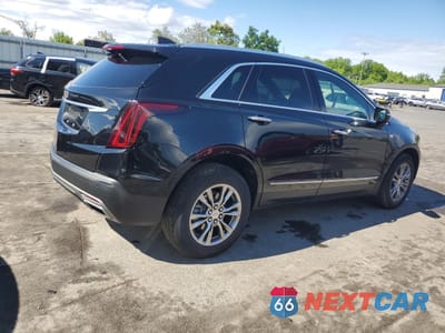 Trzecie zdjęcie samochodu z tyłu: 2020 CADILLAC XT5 PREMIUM LUXURY VIN:1GYKNDRSXLZ236123 - miniatura