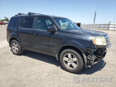 Czwarte zdjęcie samochodu z boku: 2011 HONDA PILOT EX VIN:5FNYF4H49BB087109 - miniatura