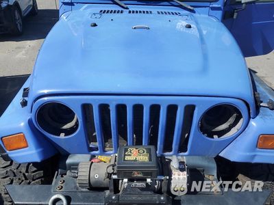 Zdjęcie 11 z 12 samochodu: 1997 JEEP WRANGLER / TJ SE VIN:1J4FY29P7VP459694 - miniatura