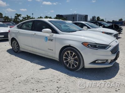 Czwarte zdjęcie samochodu z boku: 2017 FORD FUSION SE HYBRID VIN:3FA6P0LU0HR359631 - miniatura